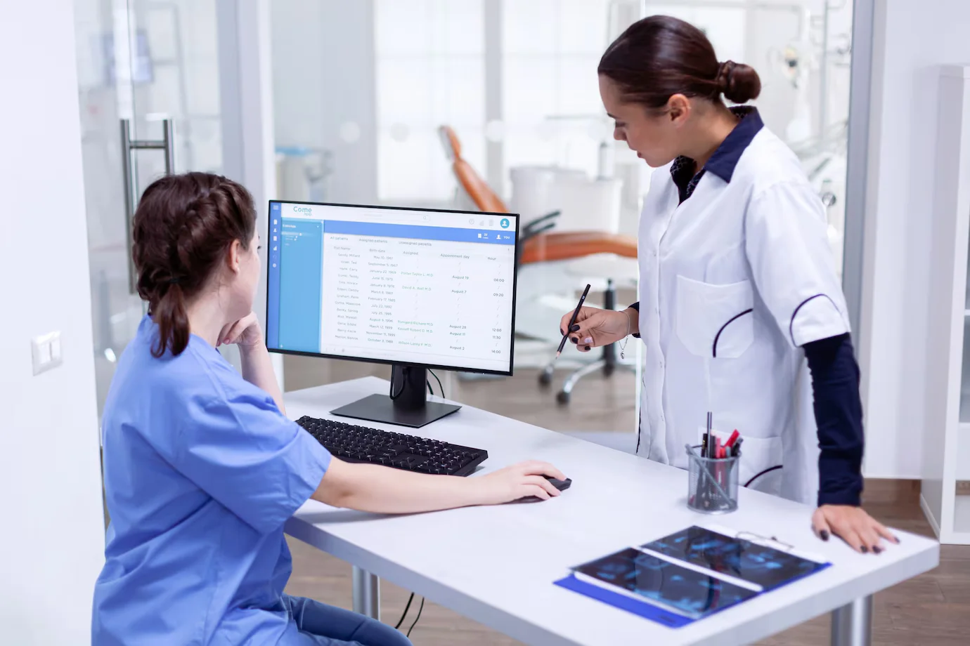 Doctor using SehatPro best EHR systems in a small clinic setting